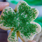 A green sprinkled sugar cookie in the shape of a shamrock. Available in Berkeley.