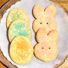 Plate of pink Easter bunny and Easter eggs sugar cookies. Available in Berkeley.