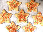 Sugar Cookies cut in the shape of stars with colorful sprinkles. Available in Berkeley.