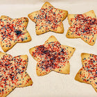 Sugar Cookies cut in the shape of stars with red, white and blue sprinkles. Available in Berkeley.