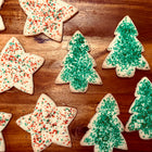 Sugar Cookies for the Winter Season - green pine trees and multi colored stars.  Pickup at El Cerrito.