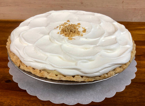 Whole Banana Cream Pie - sliced banana, pastry cream, covered with whipped cream and walnut sprinkles