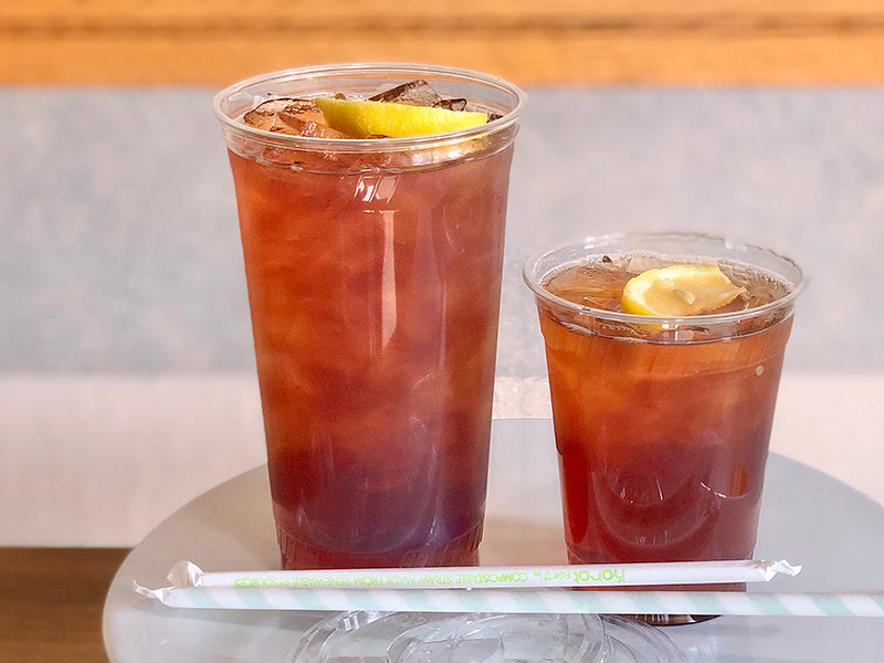 Iced Tea; two glasses one 32 ounces and the second is 16 ounces, each with a slice of lemon. Available in El Cerrito.